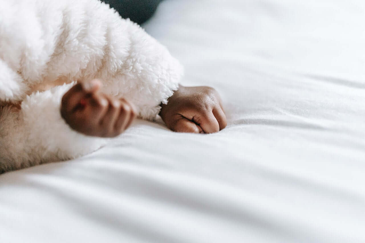 12 Month Sleep Regression: Symptoms, Causes, and Coping Strategies Photo by William  Fortunato