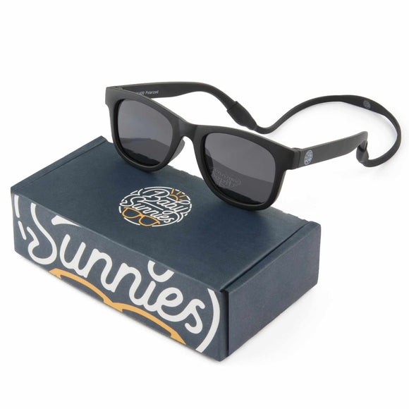 Black flexible polarized toddler sunglasses with strap, UV400 protection, eco-friendly packaging.