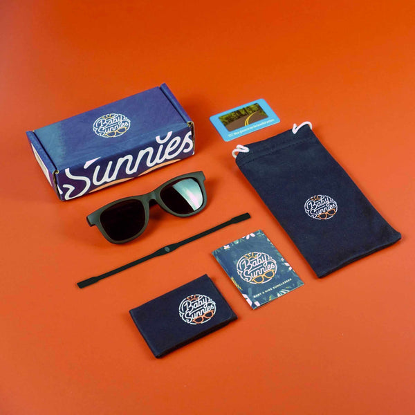 Black flexible polarized toddler sunglasses with strap, eco-friendly and UV400 protection.