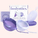 Bodyotics Comfydisc reusable menstrual discs in purple and white with carrying pouches and packaging for eco-friendly, leak-free period protection.